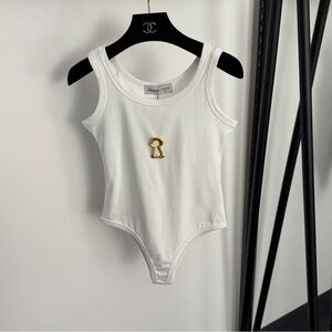 schiaparelli white sleeveless jumpsuit